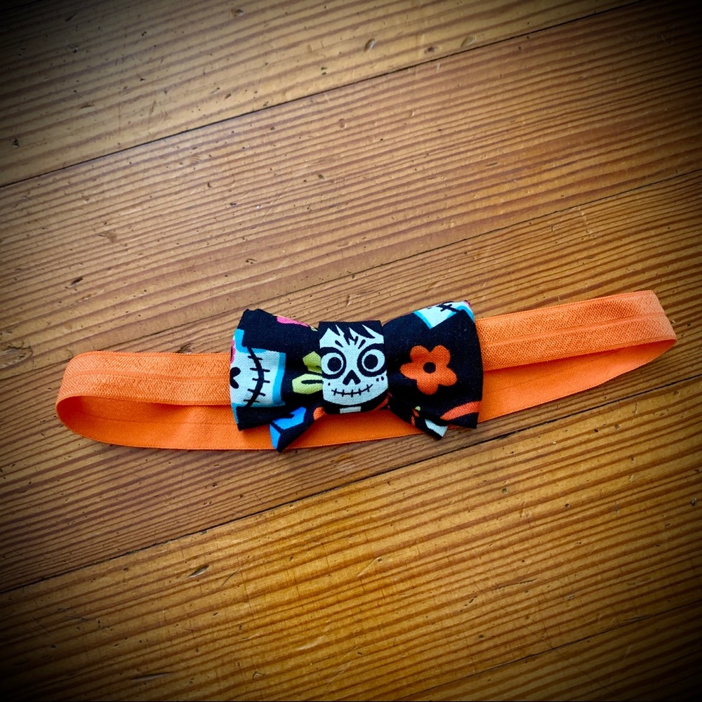 Infant baby fabric headband bow featuring Coco